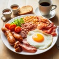 Traditional full English breakfast with fried eggs, sausages, beans, mushrooms, grilled tomatoes and bacon on white Royalty Free Stock Photo