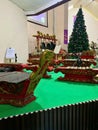Traditional Gamelan Instruments Displayed Indoors Beside Christmas Decorations Royalty Free Stock Photo