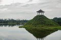 Traditional Gazebo Temple on Top of Green Hill in the middle of the lake