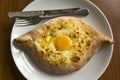 Traditional Georgian cheese pie with yolk - Hachapuri