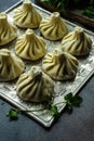 Traditional georgian khinkali dish on stone background