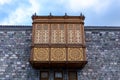 Traditional Georgian old wooden carved hanging balcony in Akhaltsikhe (Rabati) Castle courtyard, Georgia