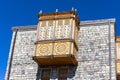 Traditional Georgian old wooden carved hanging balcony in Akhaltsikhe (Rabati) Castle courtyard, Georgia