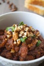 Traditional Georgian vegan kidney beam stew lobio with chopped walnuts and parsley