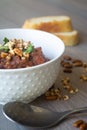 Traditional Georgian vegan kidney beam stew lobio with chopped walnuts and parsley