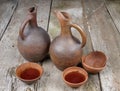 A traditional Georgian wine jug and set of clay cups