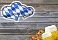 Traditional german bavarian festival Oktoberfest with pretzels, beer and gingerbread heart