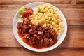 Traditional german beef casserole with spicy sauce Royalty Free Stock Photo