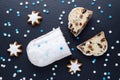 Traditional german christmas cake stollen with cookies and decoration