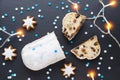 Traditional german christmas cake stollen with cookies and decoration