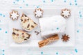 Traditional german christmas cake stollen with cookies and decoration