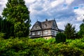 Traditional German house near Schlosshotel Kronberg in Kronberg im Taunus, Hesse, Germany 31.07.2019 Royalty Free Stock Photo