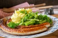 German Bratwurst with mashed potatoes and vegetables Royalty Free Stock Photo