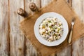 Traditional German potato salad with cucumber, onion and mayonnaise. Top view Royalty Free Stock Photo