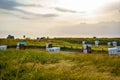 Traditional German roofed wicker beach chairs on the beach of North Sea, Nordsee, Germany, Wattenbeer. Beach with relax Royalty Free Stock Photo