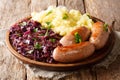 Traditional German Sausages with Mashed Potato and Sauerkraut. W Royalty Free Stock Photo