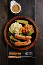 Traditional German Sausages with Mashed Potato and Sauerkraut Royalty Free Stock Photo