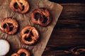 Traditional German Savory Lye Pretzel with Salt on Piece of Parchment Paper. Royalty Free Stock Photo