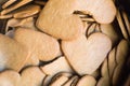 Traditional ginger bread biscuits in form of heart. Background or wallpaper in love topic. Saint Valentines sweet hearts