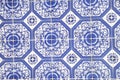 Traditional glazed blue and white ceramic tiles or azulejos which cover many buildings in Lisbon, Portugal.