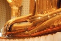 Traditional golden Buddha statue in meditation low part Royalty Free Stock Photo