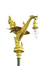 Traditional golden Thai dragon statue on the pole