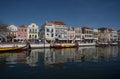 Traditional gondola boats decorated with tiles in river with historical colorful house facade in Aveiro Portugal Royalty Free Stock Photo