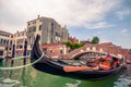 Traditional gondola and canal in Venice, Italy