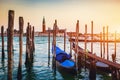 Traditional gondola in Venice at sunset