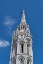 Traditional gothic church steeple over cloudy blue skies Royalty Free Stock Photo