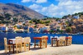 Traditional Greece - small street tavernas in Symi island, Dodecanesse