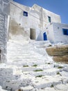 Traditional greek architecture, Stairs,  whitewashed walls and blue doors at Kastro village Royalty Free Stock Photo