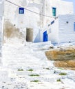 Traditional greek architecture, Stairs,  whitewashed walls and blue doors at Kastro village Royalty Free Stock Photo