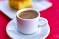 Traditional greek coffee served in white coffee set in cafe Royalty Free Stock Photo