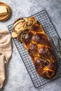 Traditional Greek Easter bread - tsoureki sliced . Sweet marbled brioche plait with nuts and chocolate Royalty Free Stock Photo