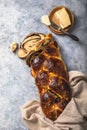 Traditional Greek Easter bread - tsoureki sliced . Sweet marbled brioche plait with nuts and chocolate Royalty Free Stock Photo