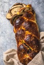 Traditional Greek Easter bread - tsoureki sliced . Sweet marbled brioche plait with nuts and chocolate Royalty Free Stock Photo