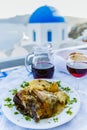 Traditional Greek food and homemade red wine Royalty Free Stock Photo