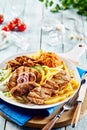 Traditional Greek grill plate with tomato rice Royalty Free Stock Photo