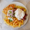 Traditional Greek and middle east fast food plate: Kebabs are minced meat sticks, grilled and served with `pita` flat bread, fried