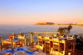 traditional greek outdoor restaurant on terrace at street village restaurant, Crete, Greece. Royalty Free Stock Photo