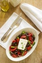 Traditional greek salad with fresh vegetables, feta cheese and olives. Royalty Free Stock Photo