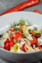Traditional greek salad with fresh vegetables, feta cheese and olives. Top view. Selective focus Royalty Free Stock Photo