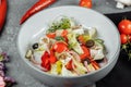 Traditional greek salad with fresh vegetables, feta cheese and olives. Top view. Selective focus Royalty Free Stock Photo