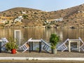 Traditional greek tavern cafe restaurant, cycladic islands,table and chairs Greece Royalty Free Stock Photo