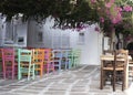 Traditional greek taverna with colorfull chairs Royalty Free Stock Photo