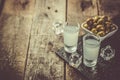 Traditional greek vodka - ouzo in shot glasses Royalty Free Stock Photo