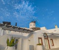 Traditional Greek windmill in Oia village on Santorini island, Greece Royalty Free Stock Photo