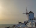 Traditional Greek windmill in Oia village on Santorini island, Greece Royalty Free Stock Photo