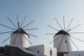 Traditional Greek windmills in Hora Mykonos Town, Mykonos, Greece Royalty Free Stock Photo